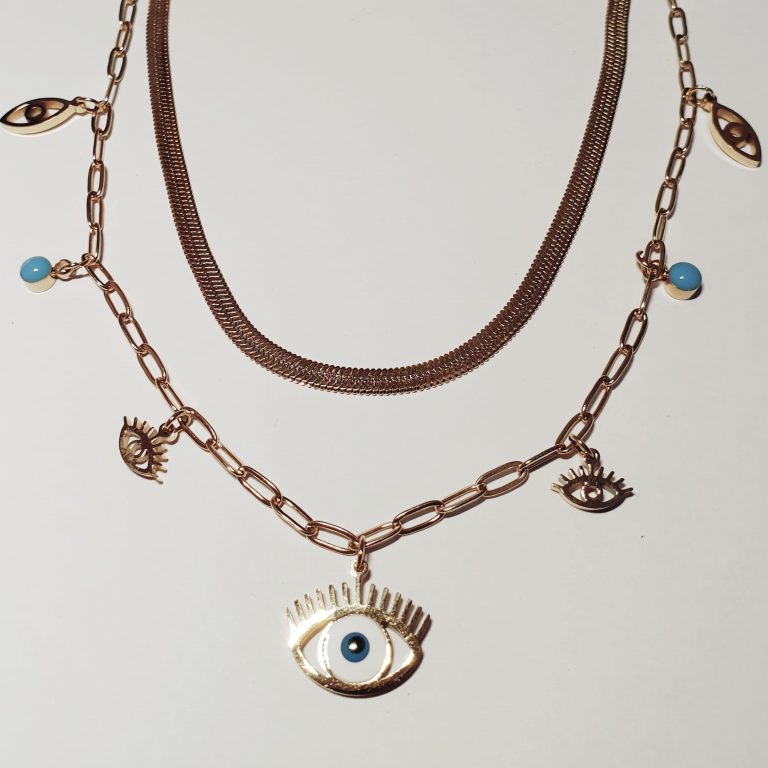 collier double chaîne, couleur or, avec des pendentifs oeil bleu