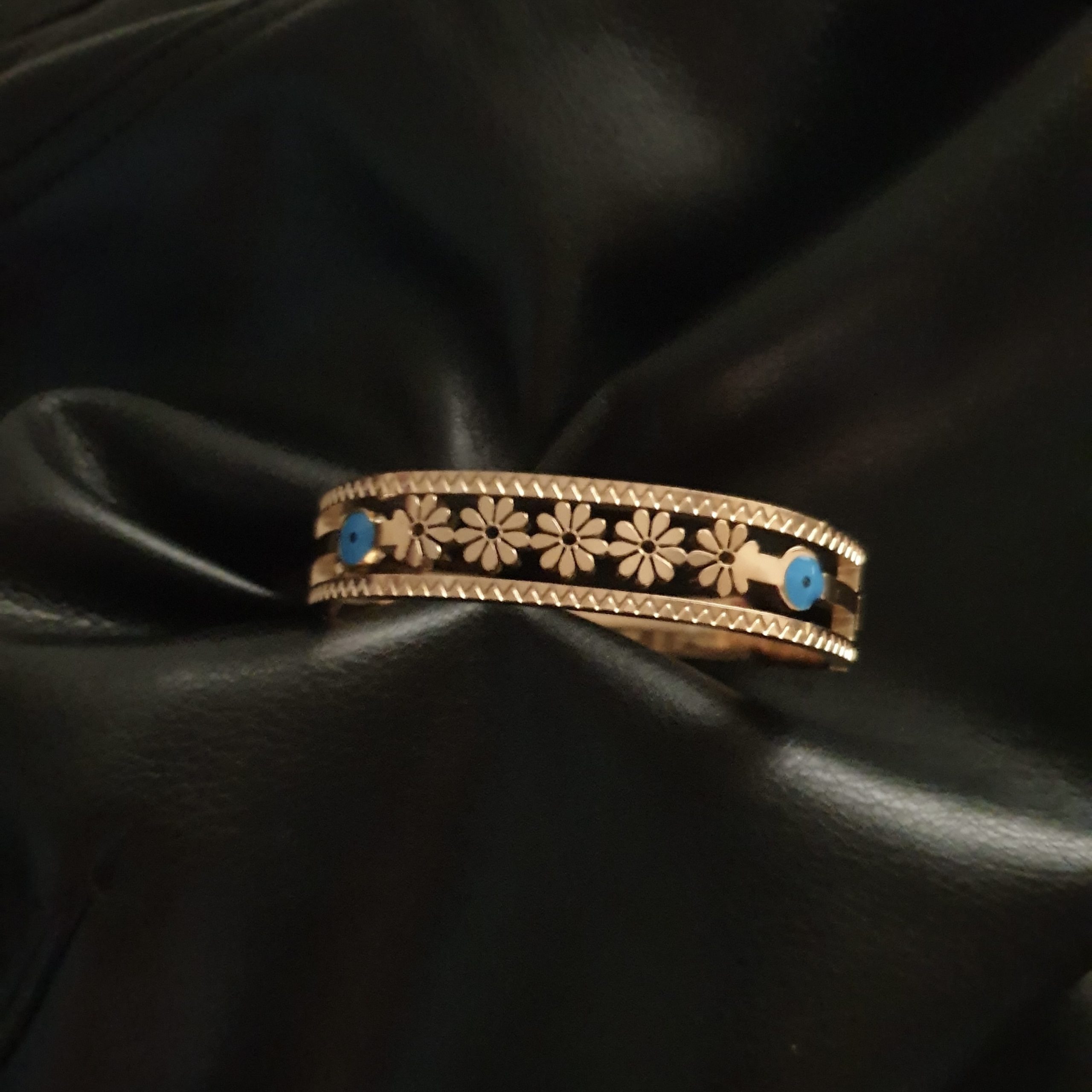 bracelet pour femme en forme de fleurs, orné des œil bleu